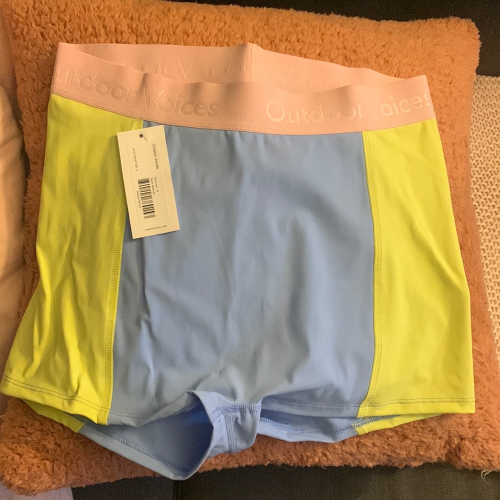 Never worn pink/blue/yellow spandex from outdoor voices